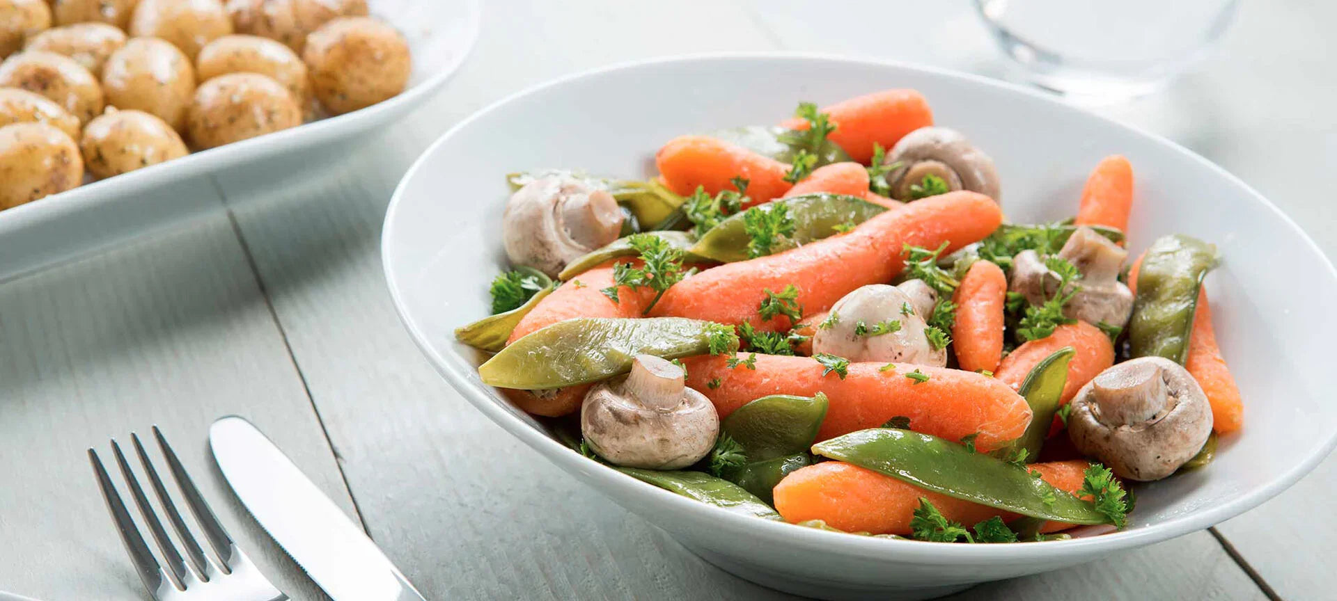 Peultjes met worteltjes en champignons